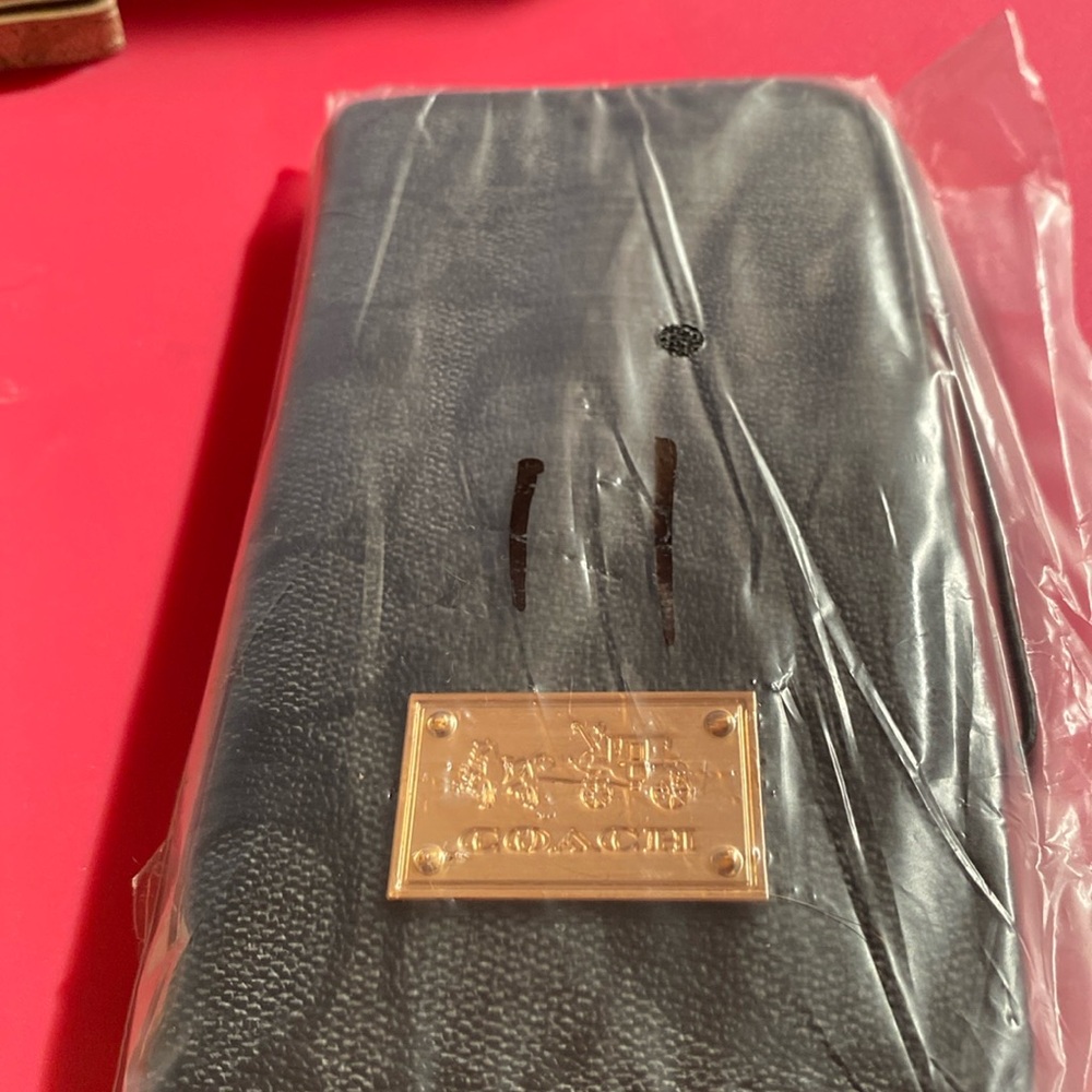 Coach iPhone 11 wallet phone case